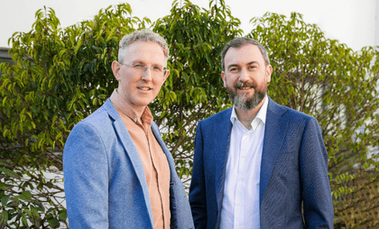 CEO and CIO of OneTouch Health photographed together for a leadership announcement