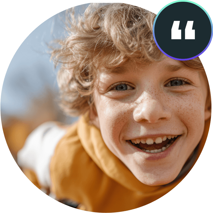 A smiling child, used as a disability support services testimonial image
