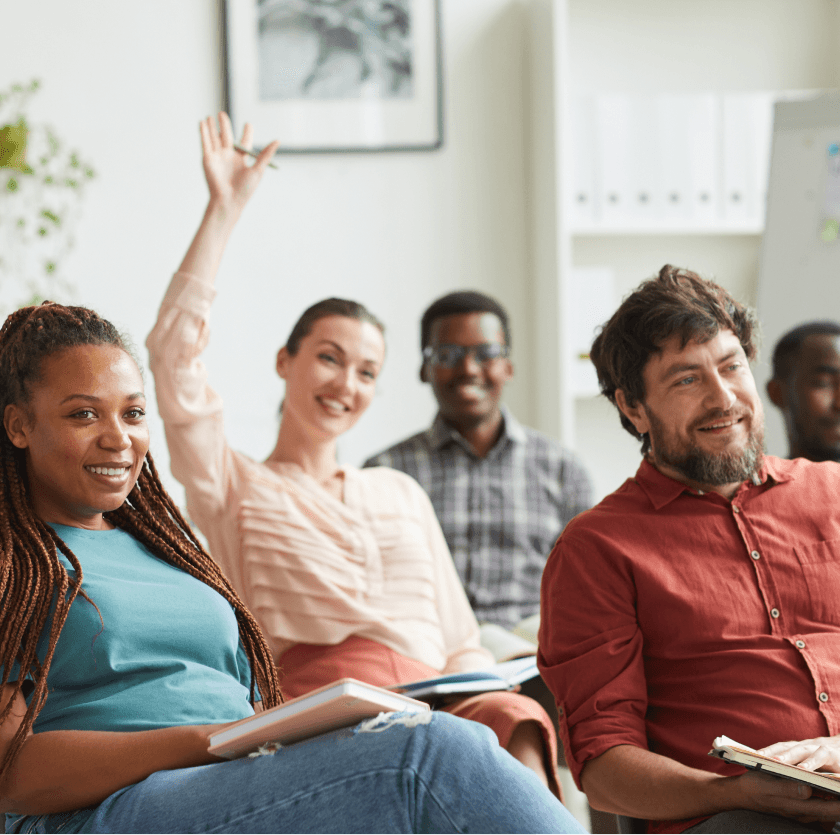 Office professionals in a collaborative setting, representing HR toolkit features for care organisations