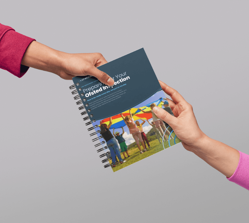 Two hands holding a OneTouch Health's "Preparing Your Osted Inspection" handbook